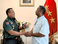 Baret Merah di Hamparan Sawah